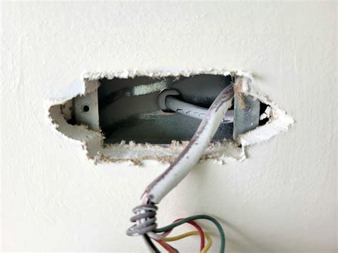 how to patch drywall around electrical box|how to repair drywall.